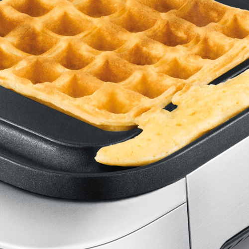 Waffle maker with no spillage out of cooking plates.